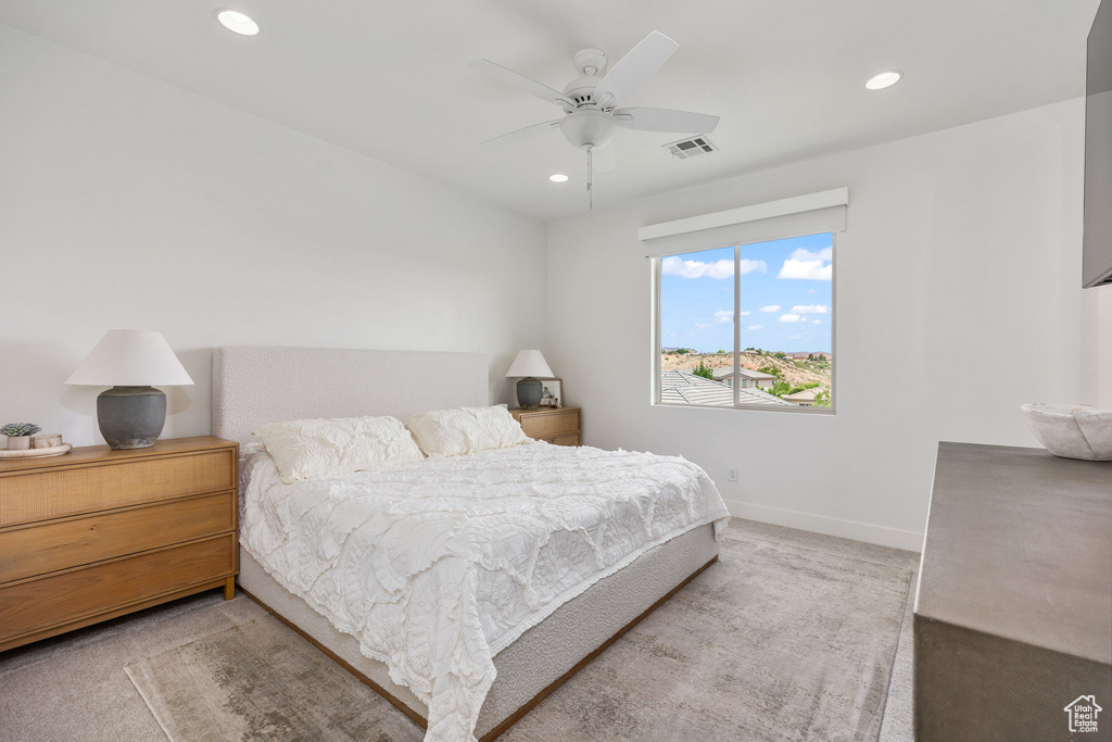 Bedroom with carpet flooring, recessed lighting, baseboards, and a ceiling fan
