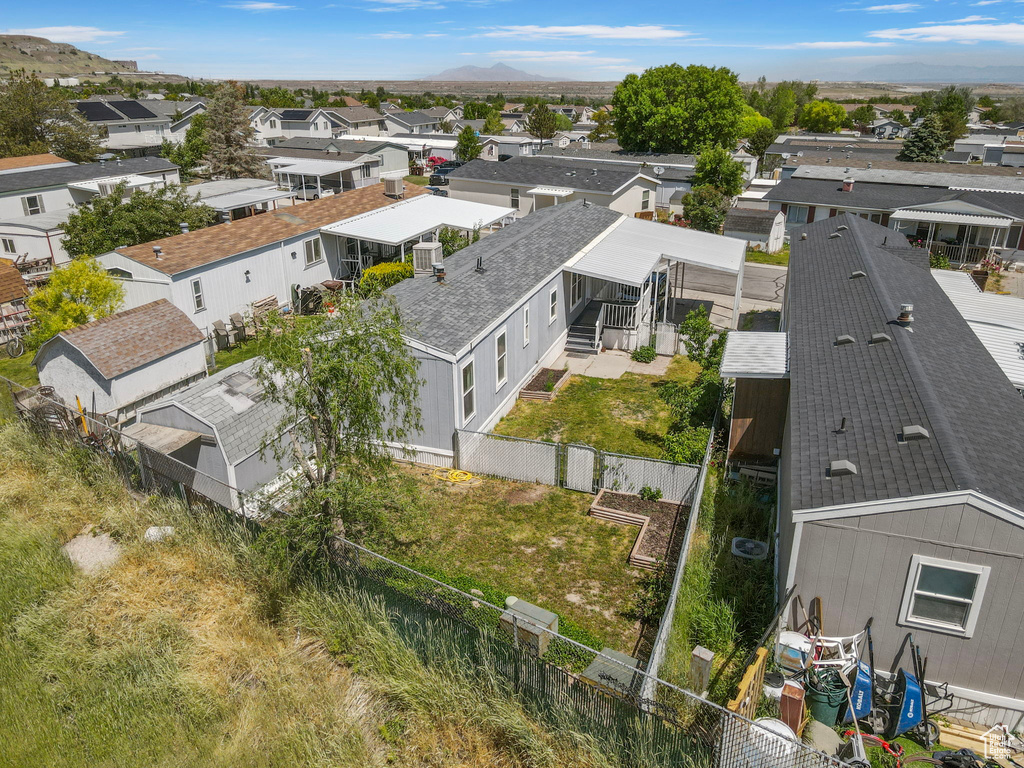 Aerial view of residential area with a mountain backdrop