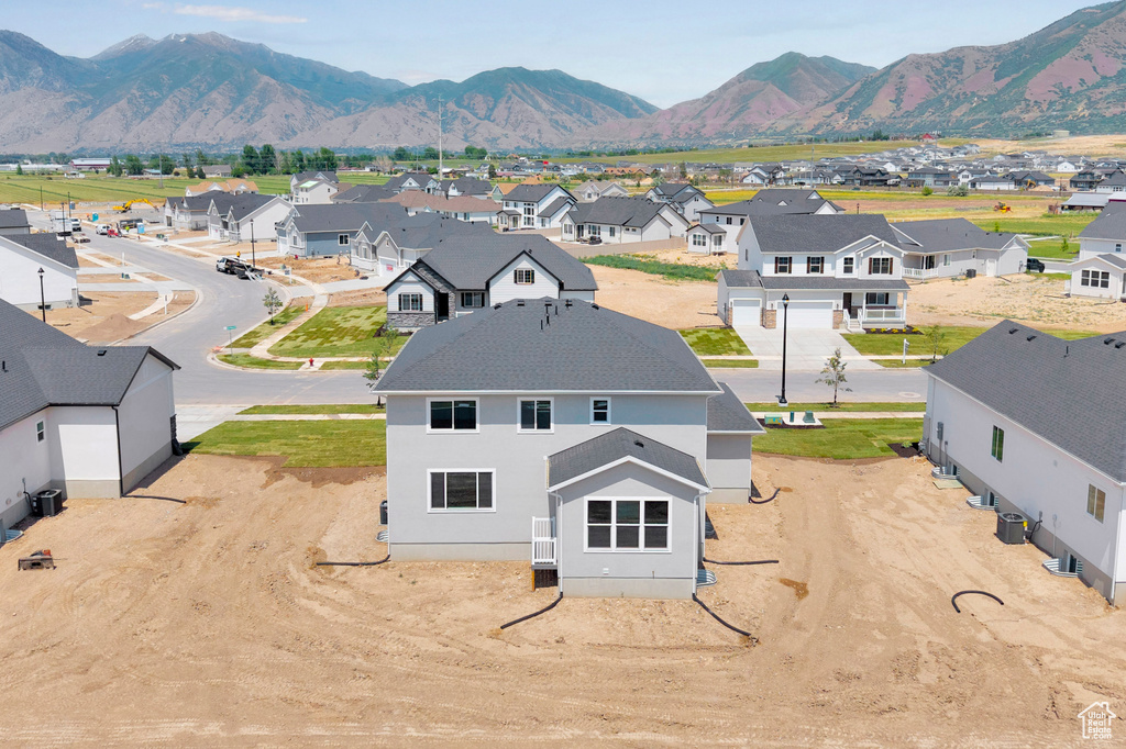 Aerial view of residential area with a mountain backdrop