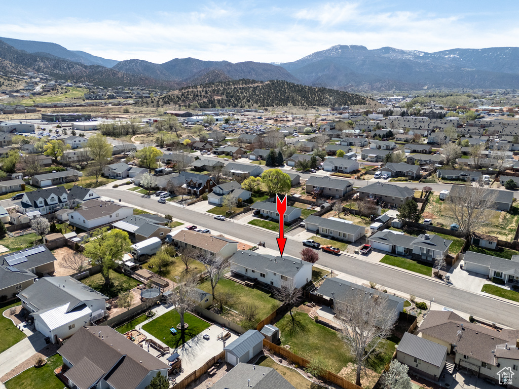 Aerial perspective of suburban area featuring mountains