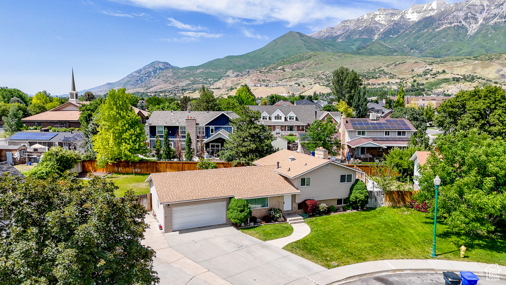 Mountain view featuring nearby suburban area