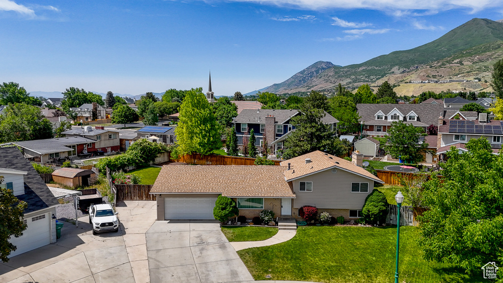 Aerial view of residential area with mountains