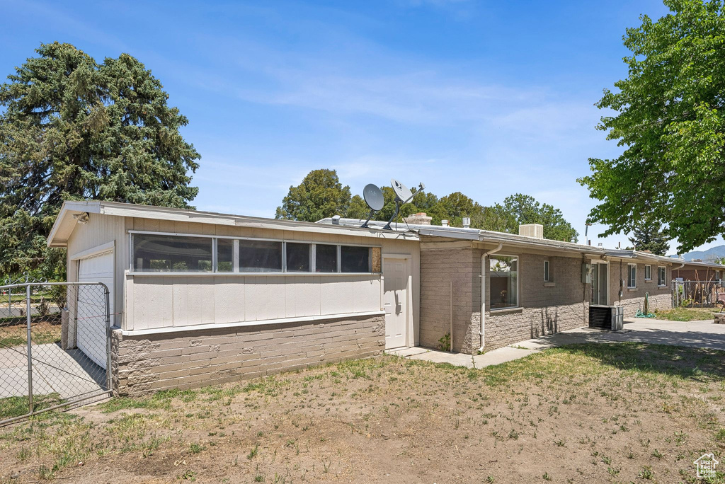 View of front of property with central AC