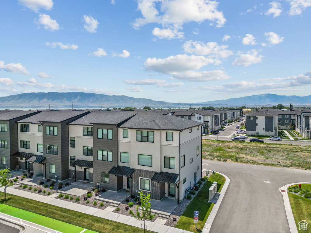 Aerial view of residential area with mountains