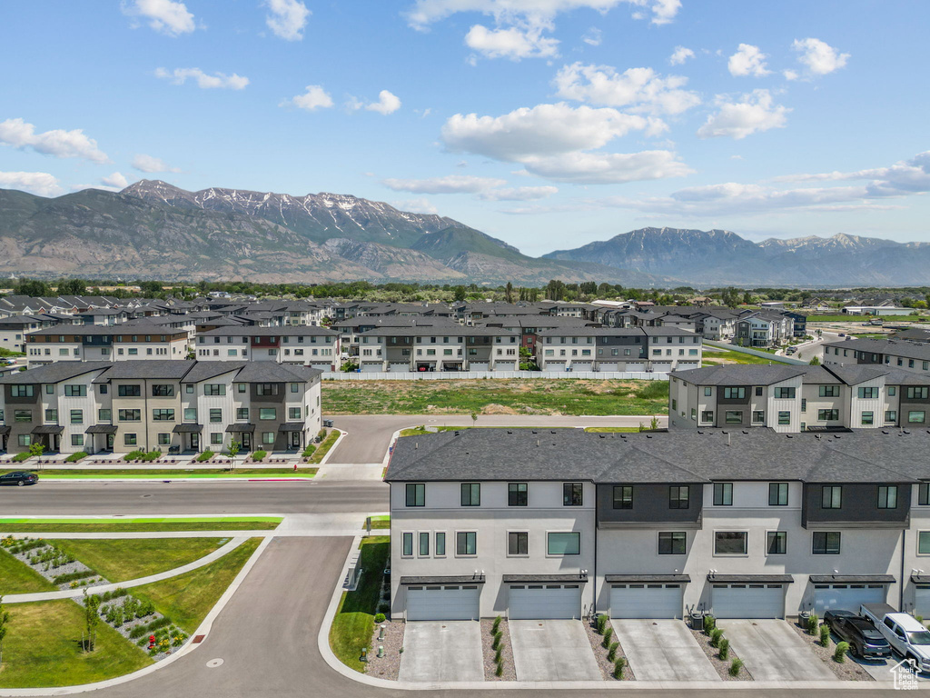 View of mountain background featuring nearby suburban area