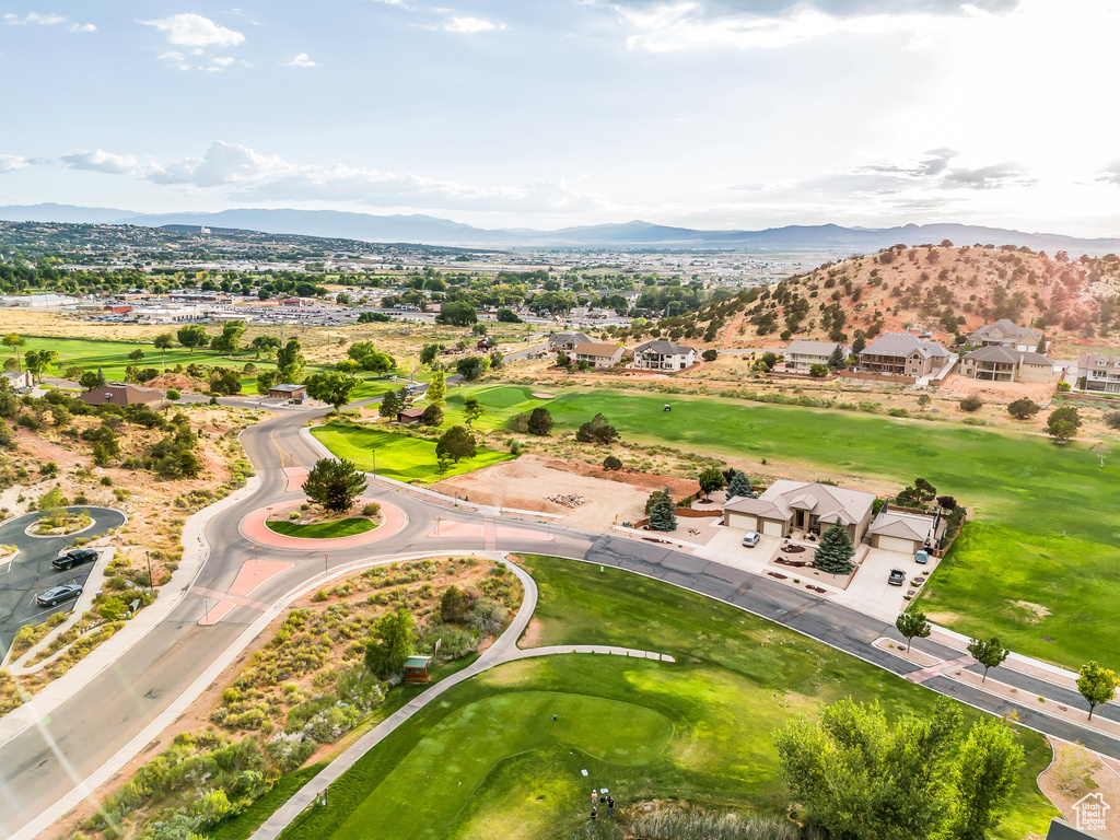 Aerial view of residential area with a mountainous background