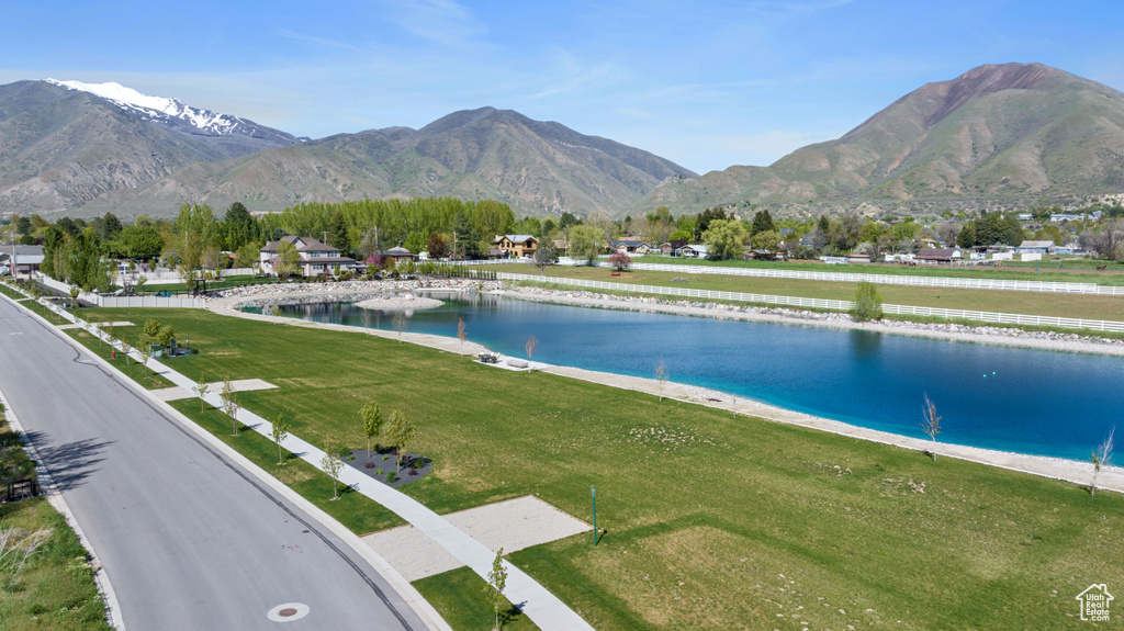 View of mountain background featuring a nearby body of water