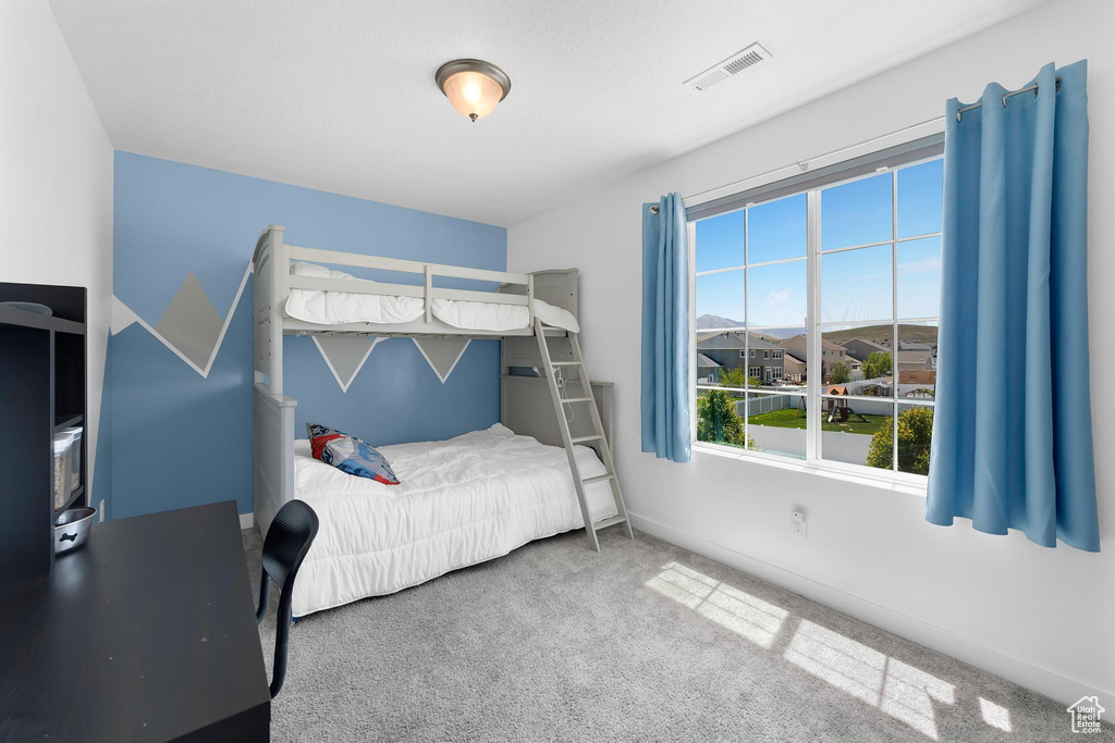 Bedroom featuring carpet floors