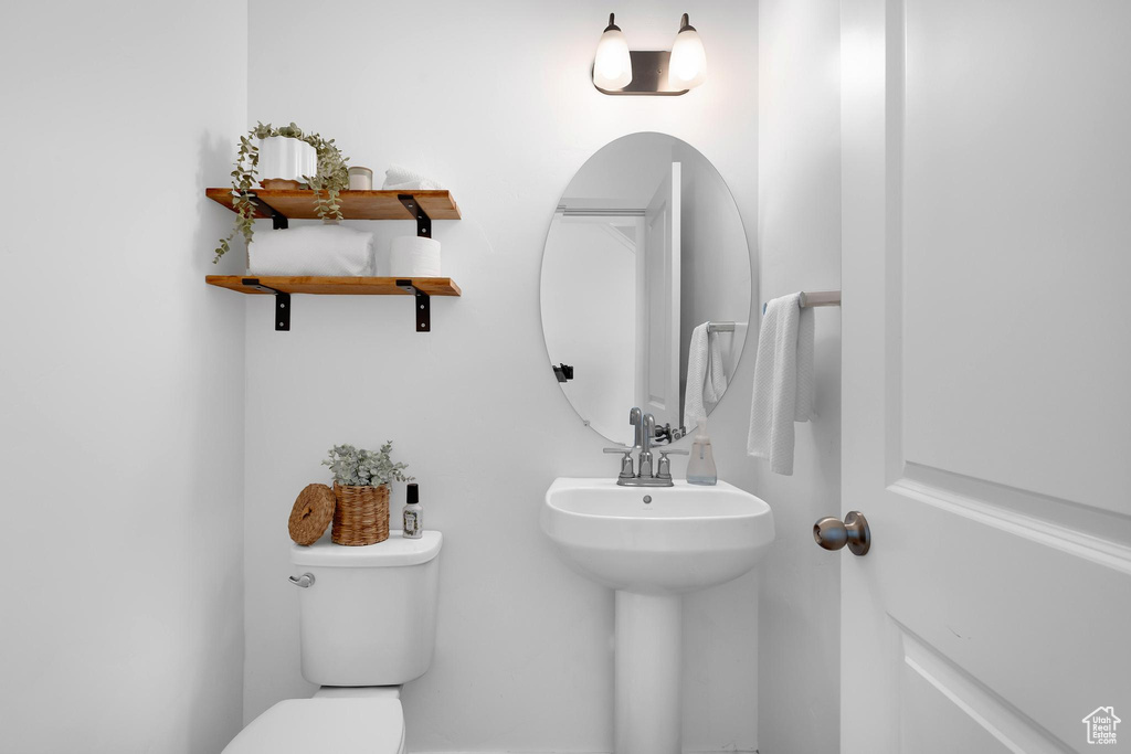 Bathroom with toilet and a sink
