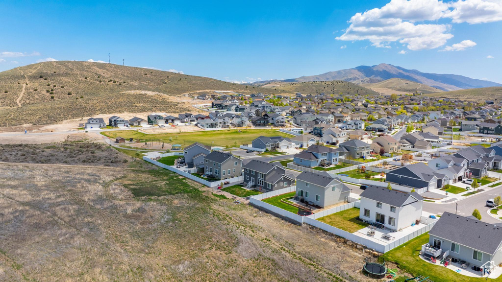 Aerial perspective of suburban area with mountains
