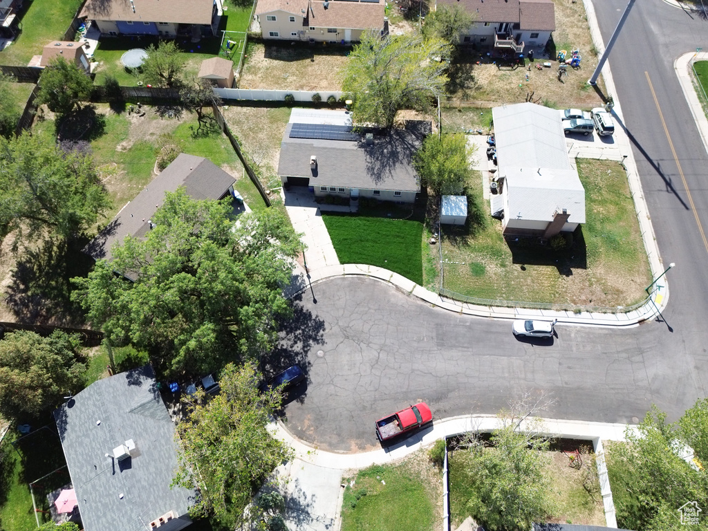 Aerial view of property's location featuring nearby suburban area