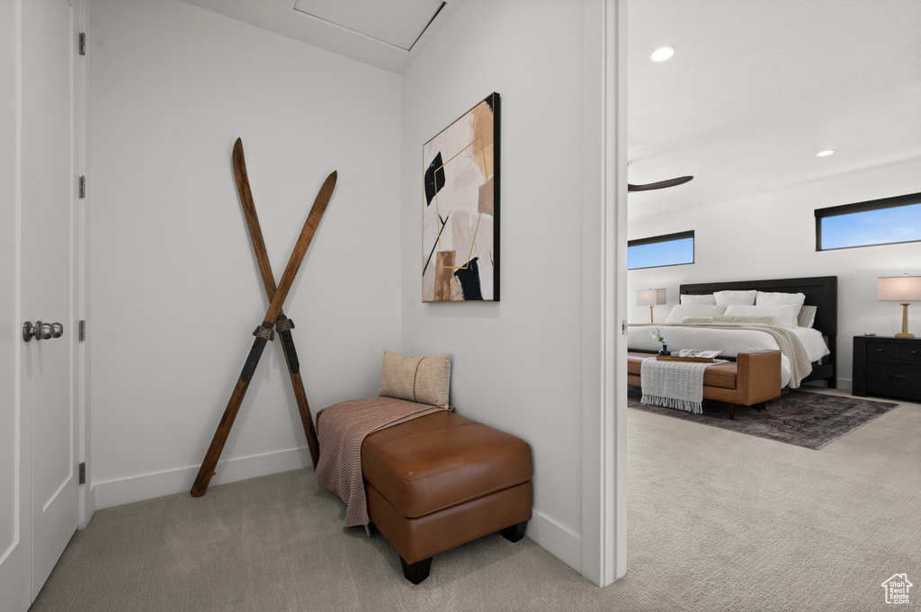 Bedroom featuring light carpet, baseboards, and recessed lighting