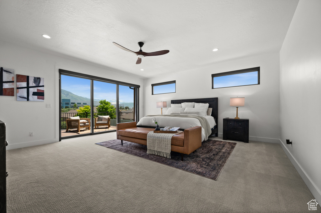 Carpeted bedroom featuring access to outside, ceiling fan, baseboards, and recessed lighting