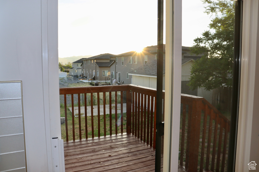 Wooden deck featuring a residential view
