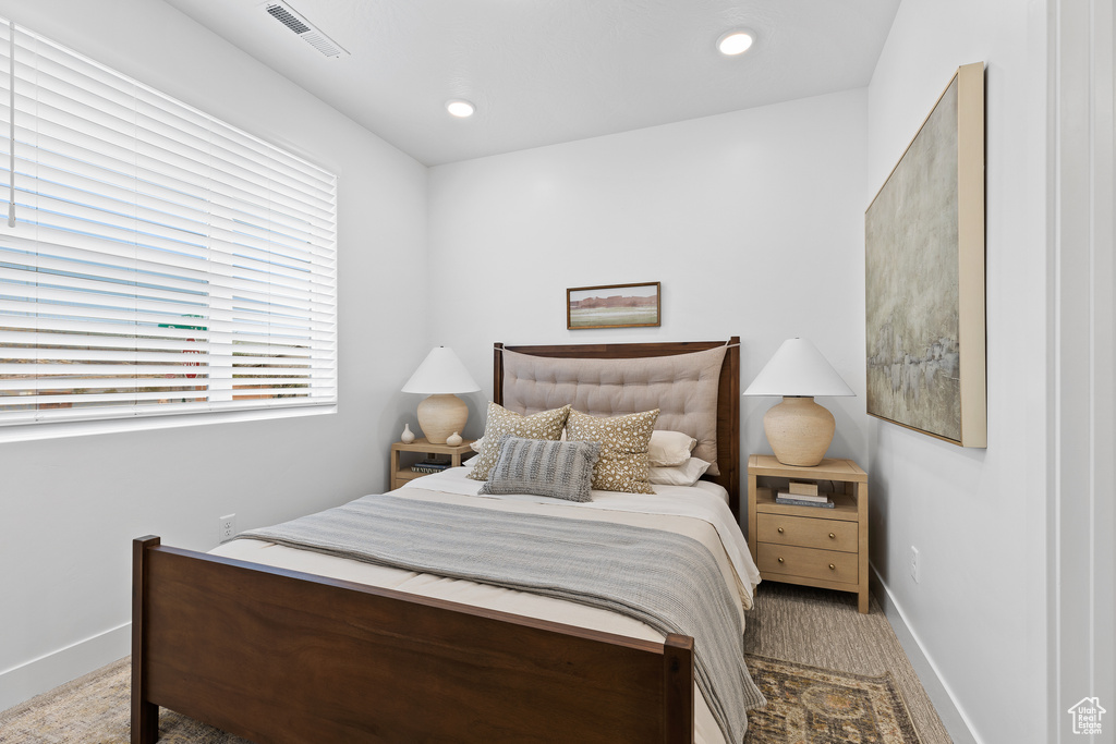 Bedroom with baseboards, carpet, and recessed lighting