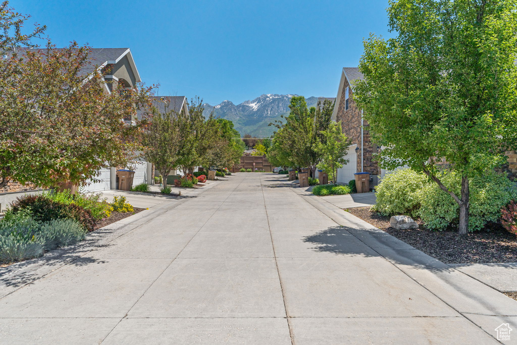 View of concrete road featuring a mountain view