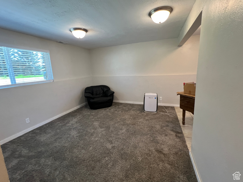 Unfurnished room with carpet floors and baseboards