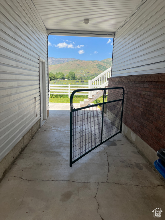 View of patio / terrace with a mountain view