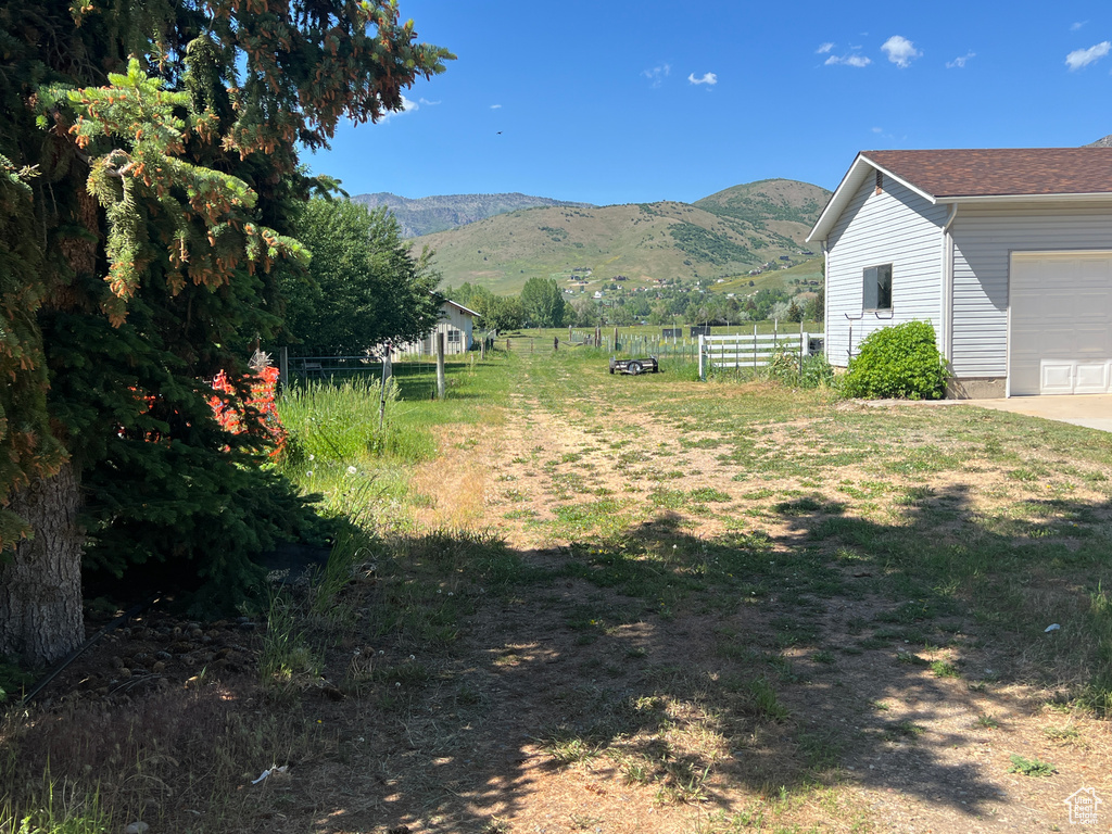 View of yard featuring a mountain view