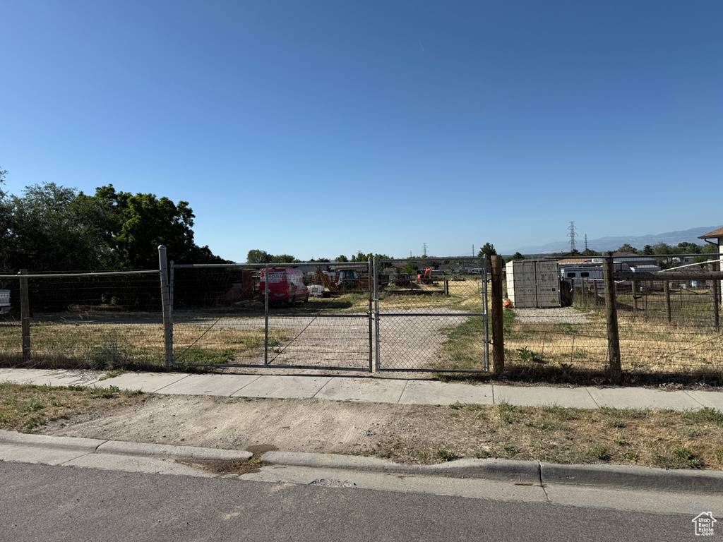 View of yard with a gate