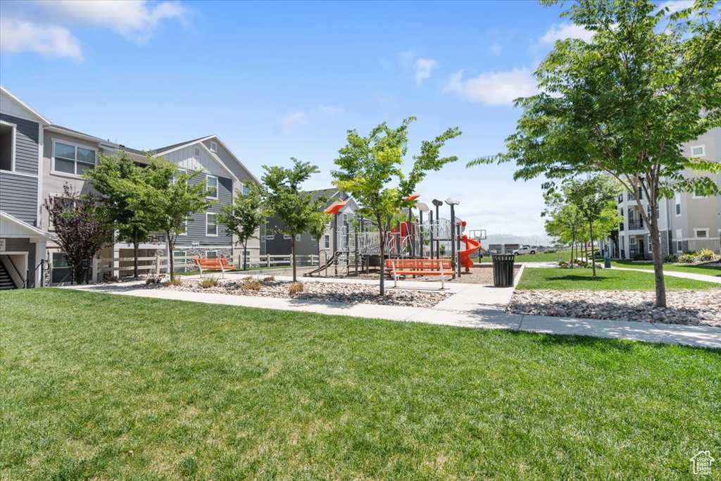 Community play area featuring a lawn