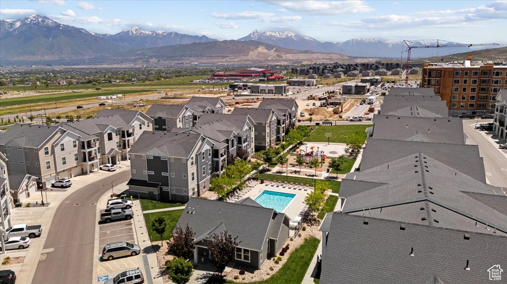 Bird\\\'s eye view of mountains and a pool area