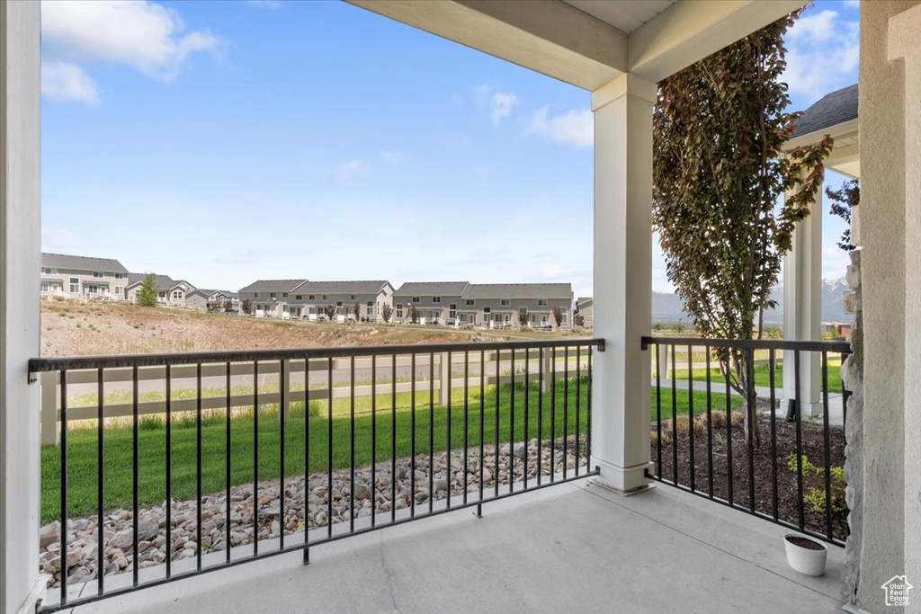 Balcony featuring a residential view