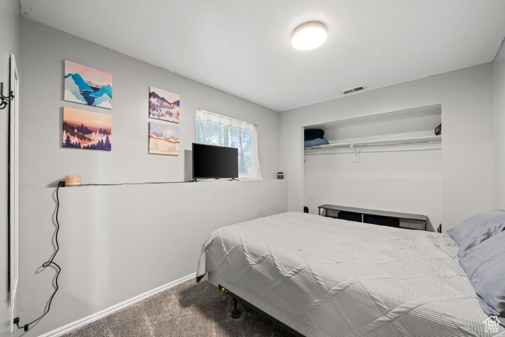 Bedroom featuring carpet