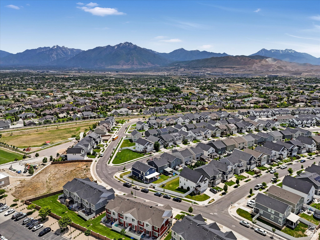 Aerial view of residential area with mountains
