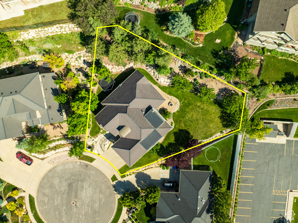 Aerial perspective of suburban area with property parcel outlined
