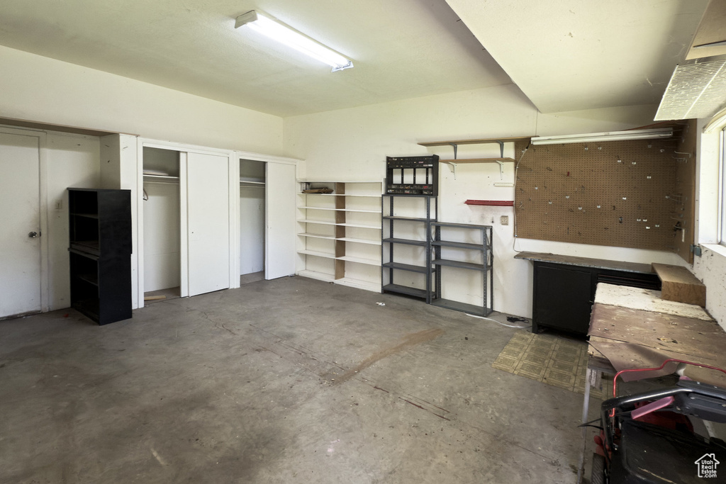 Garage featuring a workshop area