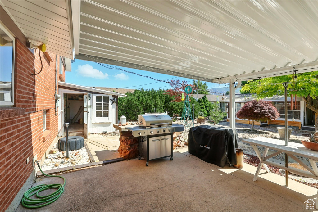 View of patio featuring grilling area