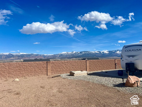 View of yard with a mountain view