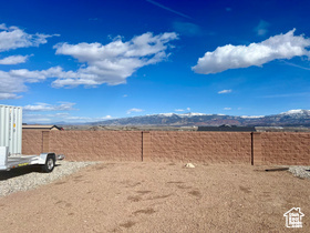View of yard with a mountain view
