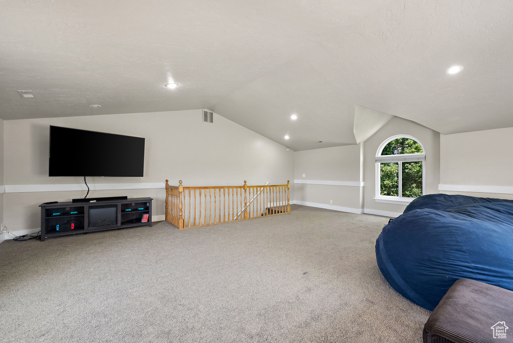 Bonus room with vaulted ceiling, carpet, recessed lighting, and baseboards