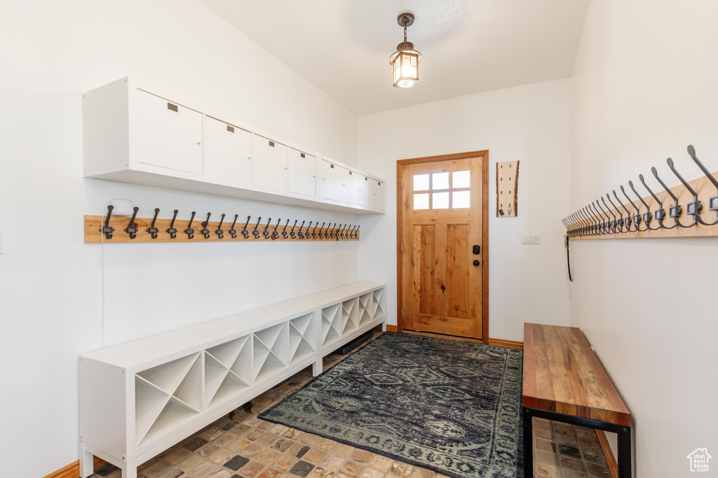 Mudroom featuring baseboards