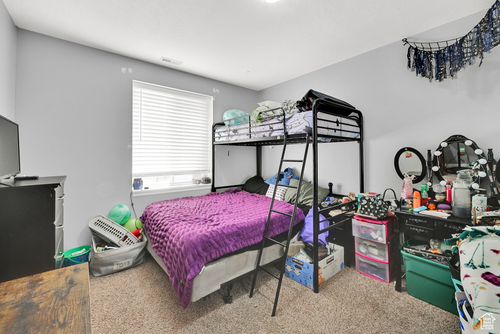 Bedroom with carpet floors