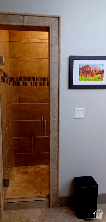 Bathroom featuring a shower stall