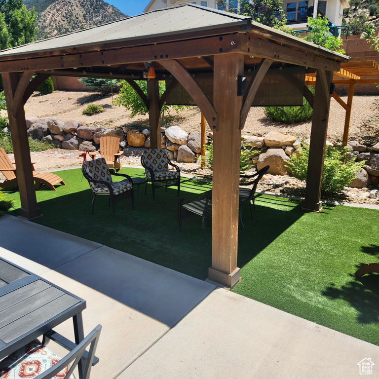 View of patio / terrace with a gazebo