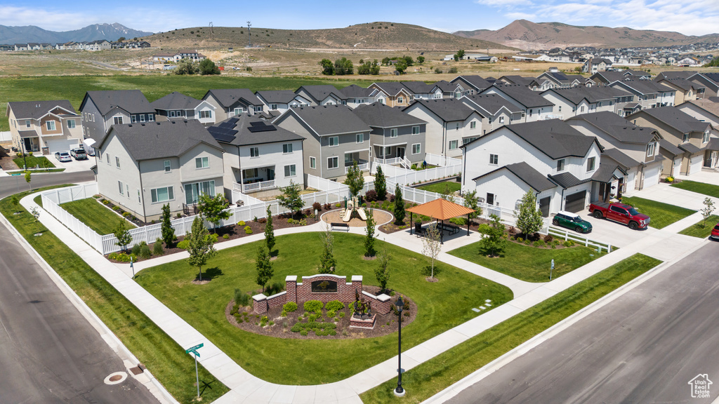 Aerial view of residential area with mountains