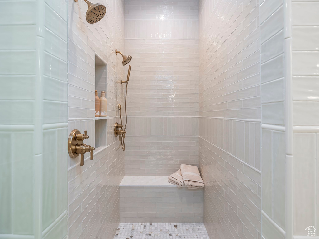 Bathroom featuring tiled shower