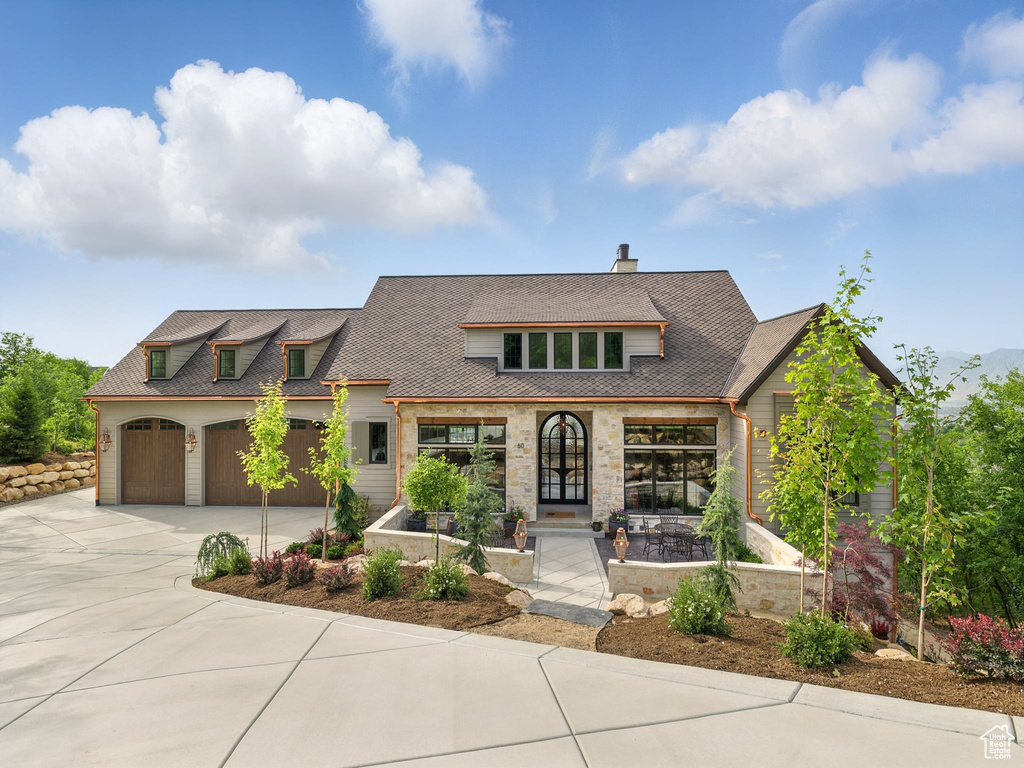 View of front of home with concrete driveway