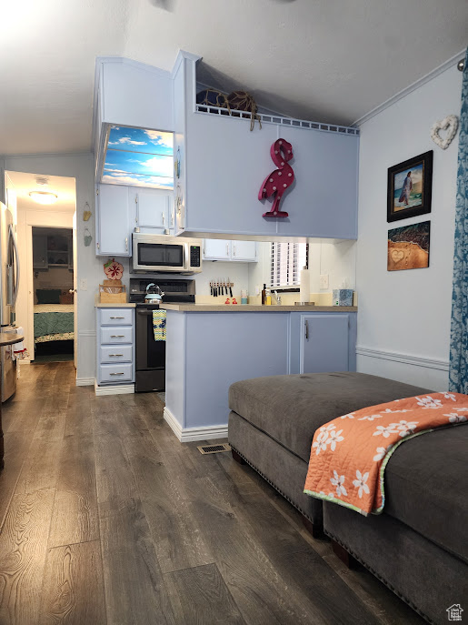 Bedroom featuring dark wood-style flooring
