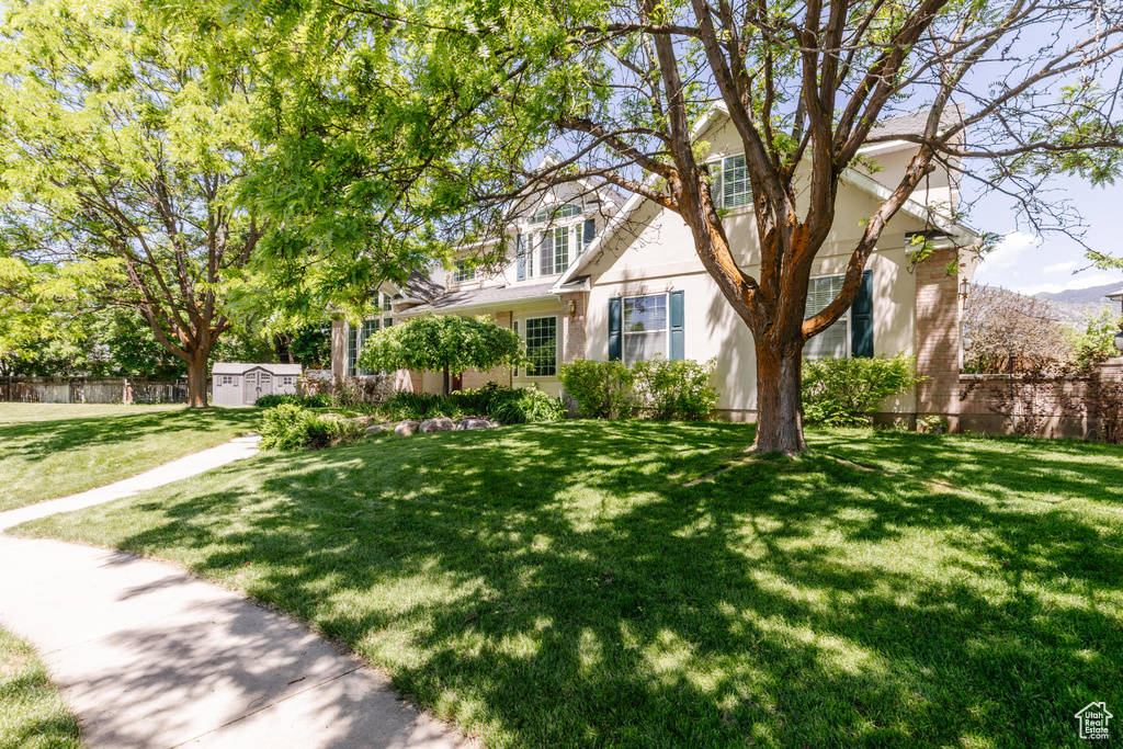 View of front of house featuring stucco siding