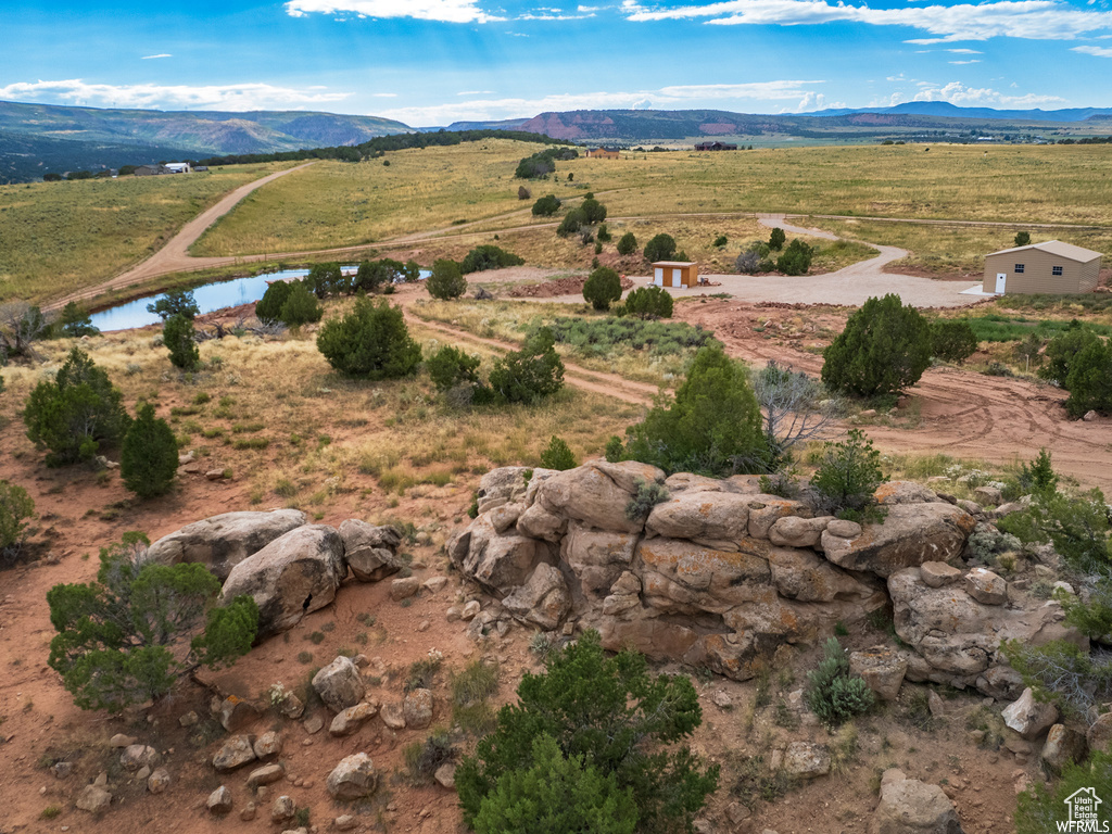 Aerial overview of property\\\\\\\'s location with a mountain backdrop and rural landscape