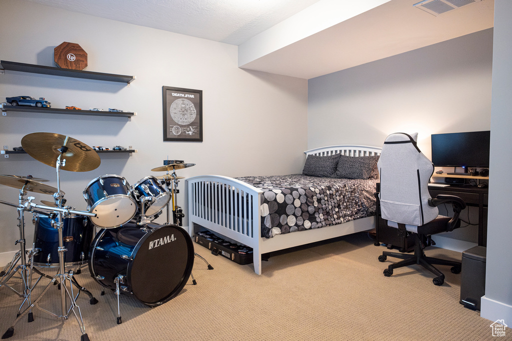 View of carpeted bedroom
