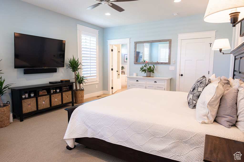 Bedroom featuring recessed lighting, a ceiling fan, baseboards, and light colored carpet