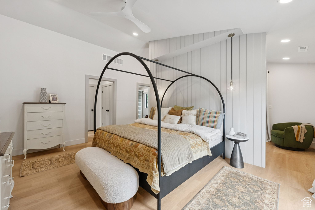 Bedroom featuring light wood-style floors, recessed lighting, ceiling fan, and vaulted ceiling