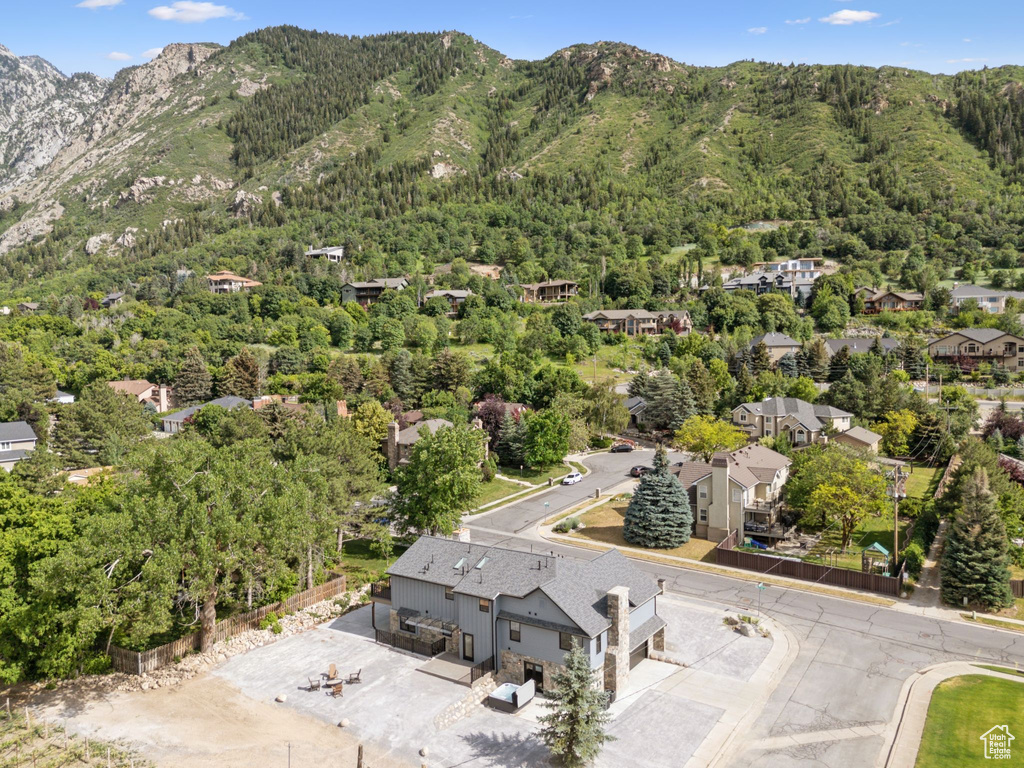 Drone / aerial view of mountains and a heavily wooded area