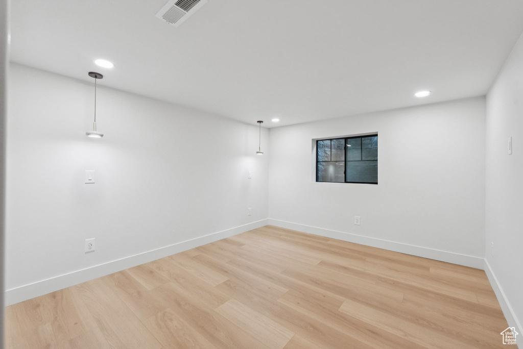 Spare room featuring recessed lighting and light wood-style flooring